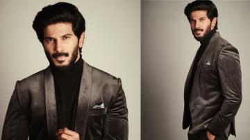 A smouldering Dulquer Salman in a charcoal suit