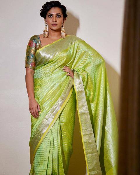 Parvathy Thiruvothu attended the Vanitha Awards wearing this green Kancheepuram saree from Madhurya Creations  - Fashion Models